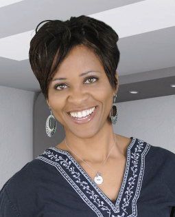 Nicole Headshot in blue shirt