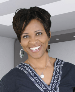 Nicole Headshot in blue shirt