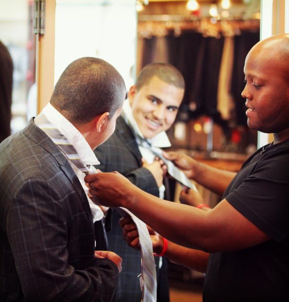 mentoring-man-helping-youth-with-tie