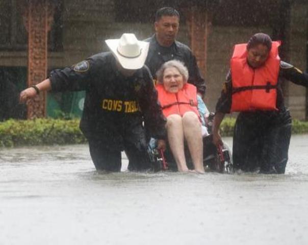 Hurricane Harvey police officers rescue elderly woman