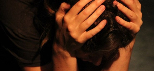 lamentin person bent over